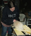 Jessica sanding Stephen's hull. Photo: SR